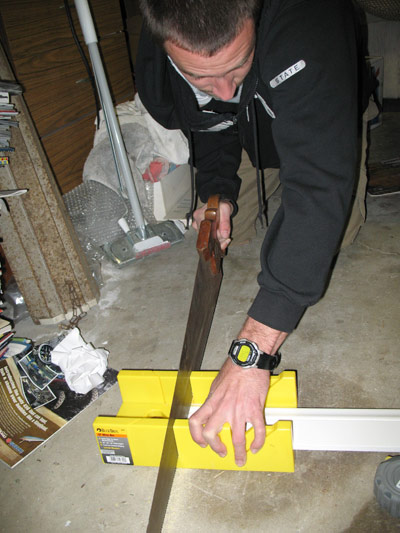 adam cutting baseboard